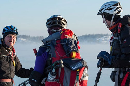 ice skating guide advising the tour participants about the ice conditions