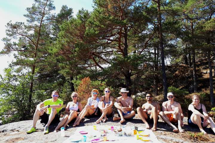 a group of people on a beach