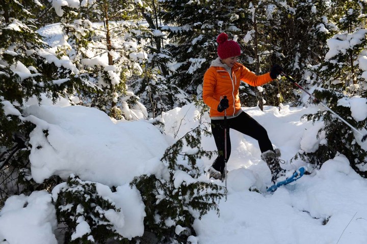a man skiing down a snowy hill
