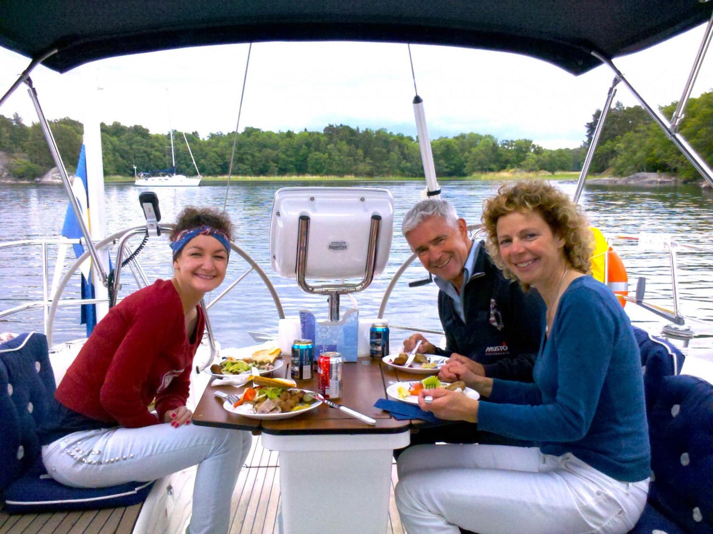 a person sitting on a boat in the water